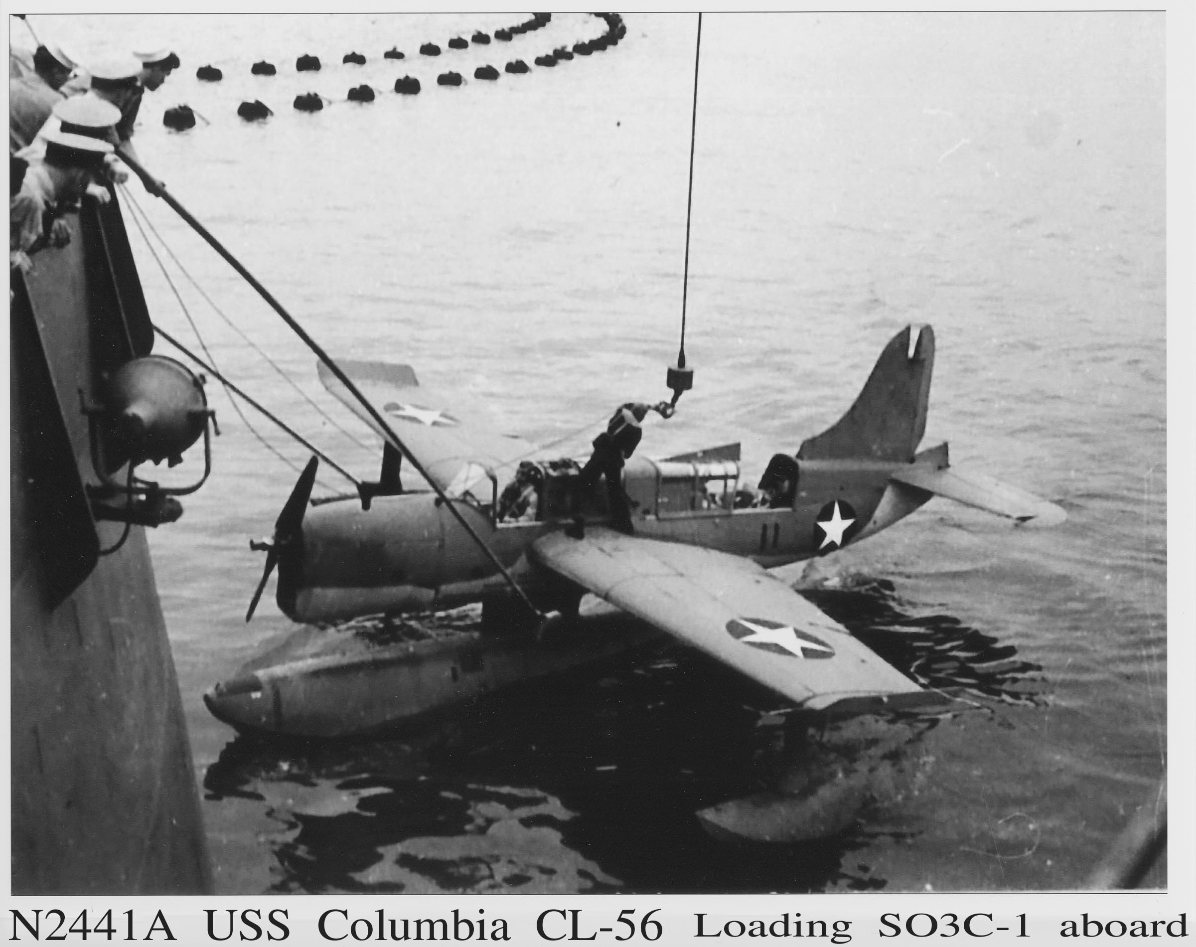 plane being lifted aboard