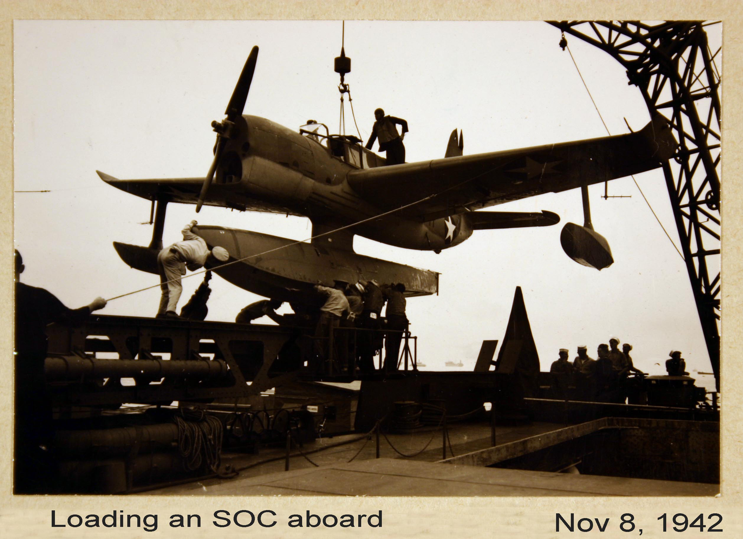 plane being loaded aboard 5